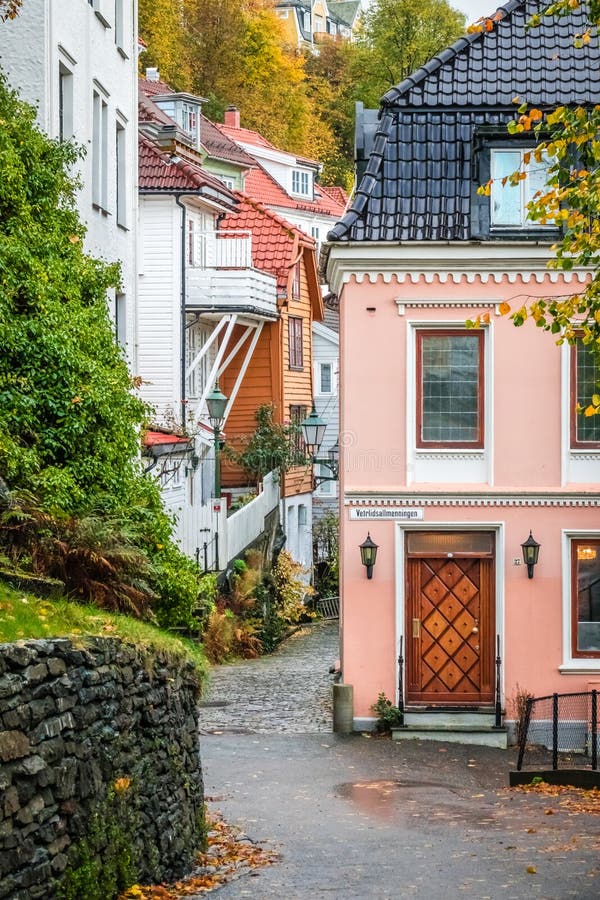 Narrow cobble stoned streets between old traditional houses in the old part of Bergen town, Norway. Narrow cobble stoned streets between old traditional houses in the old part of Bergen town, Norway