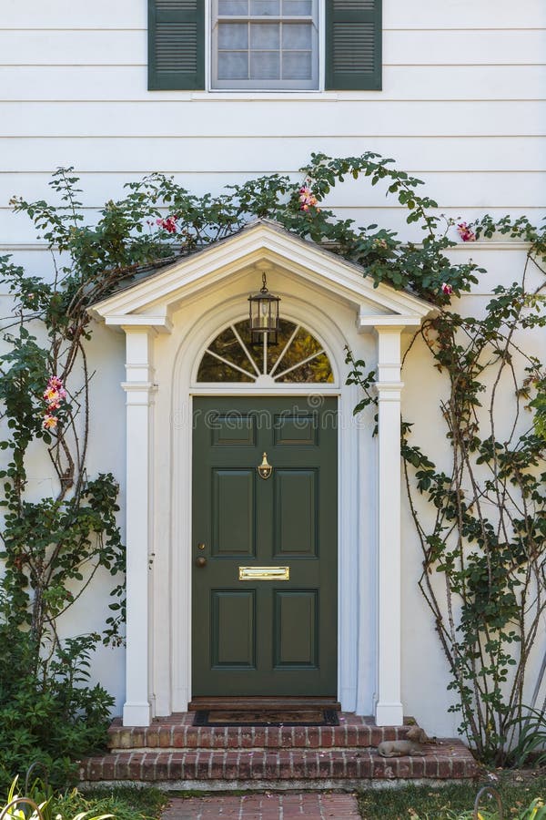 Black Front Door with White Door Frame and Greenery Stock Image Image of elegant, street 47098011