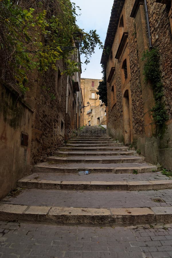 Narrow street with staircase in Piazza Armerina to