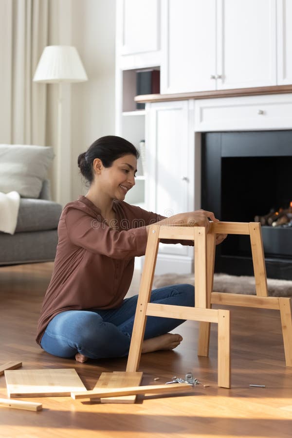 Narrow view of ethnic woman gather furniture