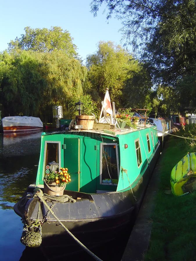 Narrowboat on river Cam, UK royalty free stock image