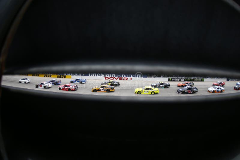 The NASCAR Xfinity Series teams zoom into turn 1 after taking the green flag for the OneMain Financial 200 at Dover International Speedway in Dover, Delaware. The NASCAR Xfinity Series teams zoom into turn 1 after taking the green flag for the OneMain Financial 200 at Dover International Speedway in Dover, Delaware.