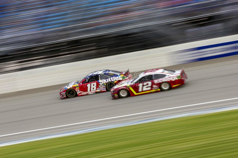 June 30, 2019 - Joliet, Illinois , USA: Kyle Busch 18 battles for position for  the track for the Camping World 400 at Chicagoland Speedway in Joliet, Illinois. June 30, 2019 - Joliet, Illinois , USA: Kyle Busch 18 battles for position for  the track for the Camping World 400 at Chicagoland Speedway in Joliet, Illinois