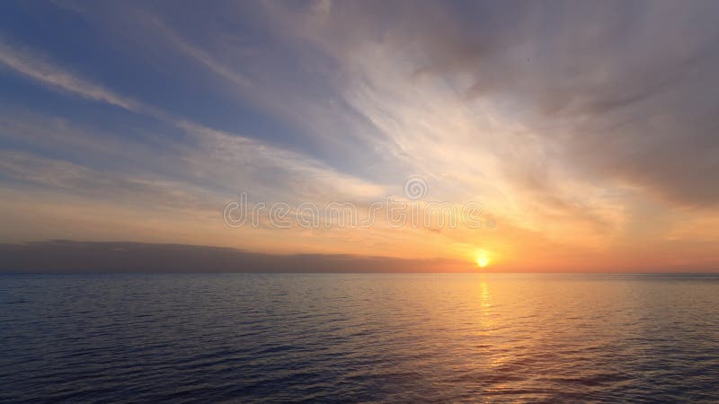 Early morning sunrise on a choppy river / wind early spring landscape. Early morning sunrise on a choppy river / wind early spring landscape