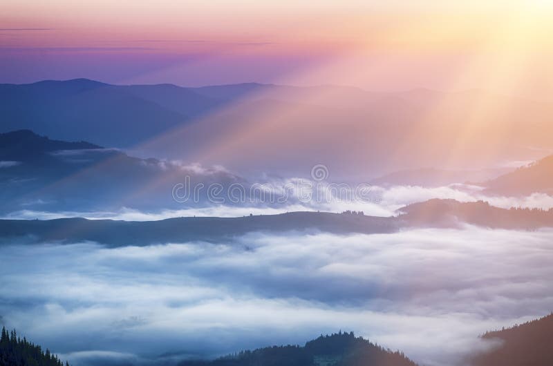 Carpathian mountains summer sunrise landscape with sun and foggy river, travel natural background. Carpathian mountains summer sunrise landscape with sun and foggy river, travel natural background