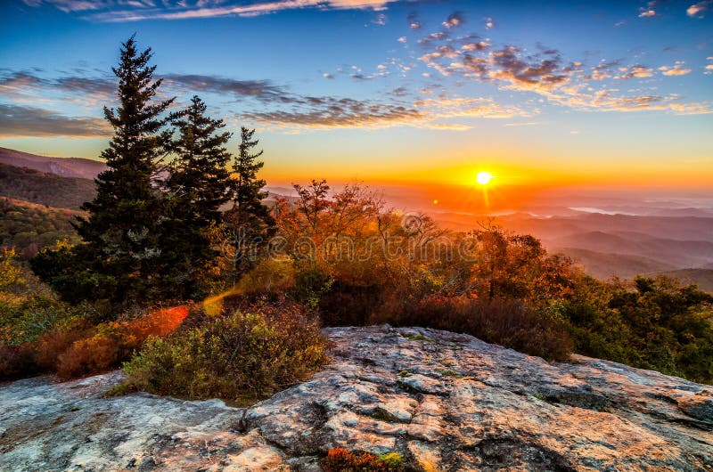 This is a beautiful fall sunrise from Beacon Heights Overlook along the Blue Ridge Parkway in Western North Carolina. This is a beautiful fall sunrise from Beacon Heights Overlook along the Blue Ridge Parkway in Western North Carolina.