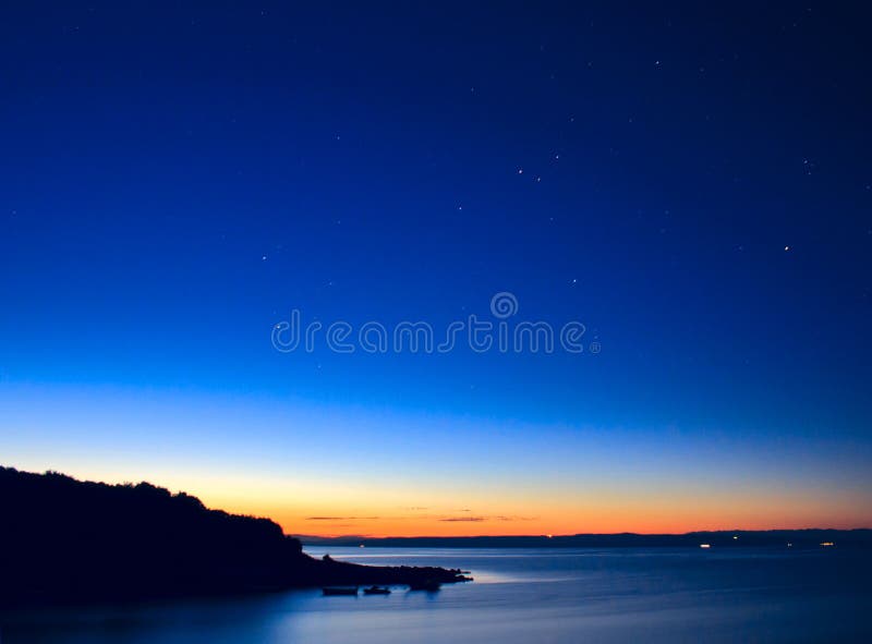 Nascer do sol e estrelas imagem de stock royalty free