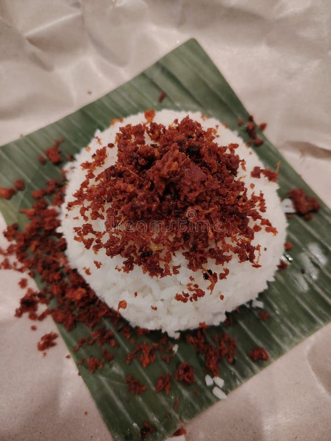 Nasi lemak - это малайское ароматное блюдо из риса, приготовленное в кокосовом молоке и пандане стоковое изображение