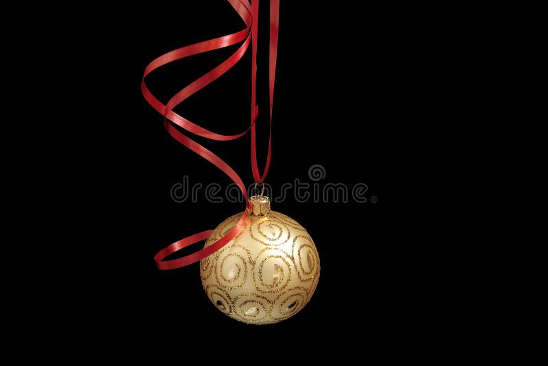 Christmas decoration with red ribbons isolated on black background. Christmas decoration with red ribbons isolated on black background