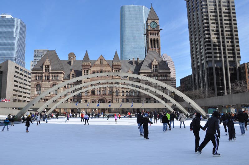 Skaters in Nathan Phillips Square, Toronto, Canada