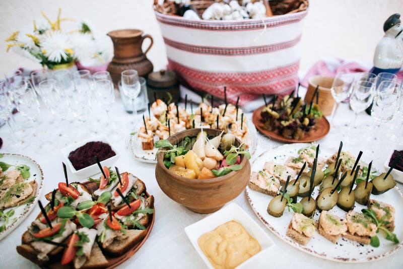 National traditional buffet table with alcohol and snacks at the wedding celebration stock photography