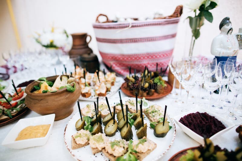National traditional buffet table with alcohol and snacks at the wedding celebration stock photo