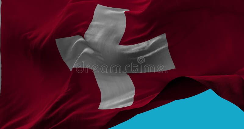 Nationsflagga av Schweiz som vinkar i vindultrarapiden