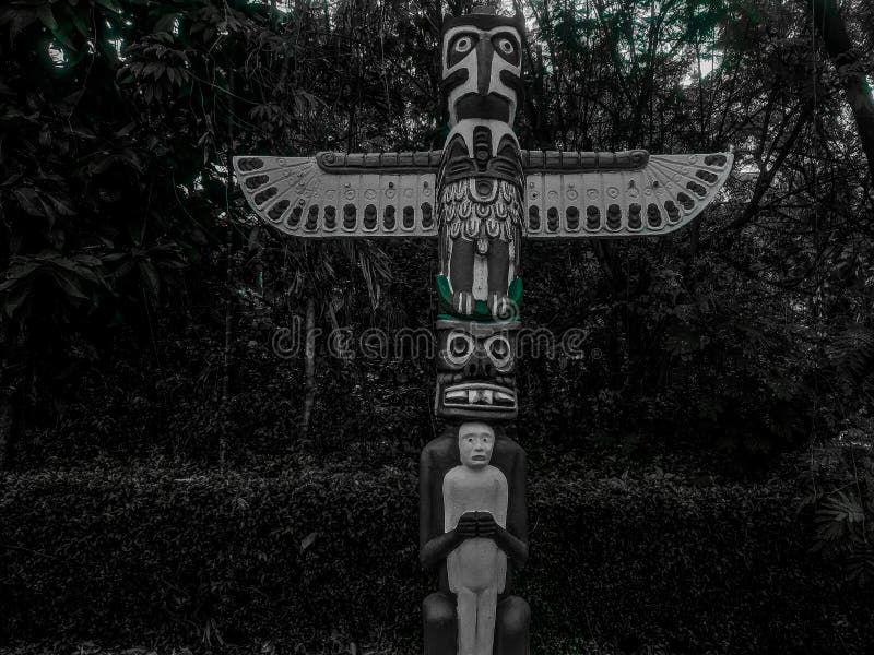 Native Totem Poles representing the art and religious symbols of the community