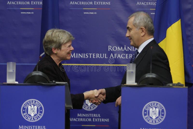 BUCHAREST, ROMANIA - November 07, 2016: NATO Deputy Secretary General Rose Gottemoeller shakes hands with Foreign Minister of Romania, Lazar Comanescu after the joint press conference.