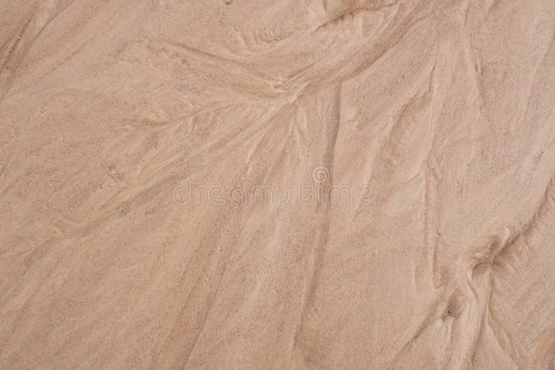 Wet brown sand nature texture for background, abstract for design. Wet brown sand nature texture for background, abstract for design