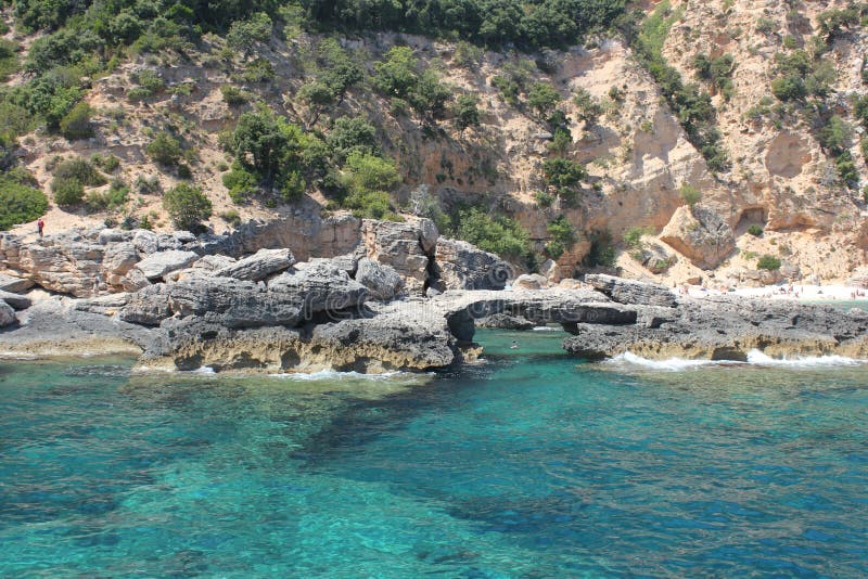 Natural arc in the National Park of the Gulf of Orosei and Gennargentu - Sardinia royalty free stock photography Natural arc in the National Park of the Gulf of Orosei and Gennargentu - Sardinia royalty free stock photography