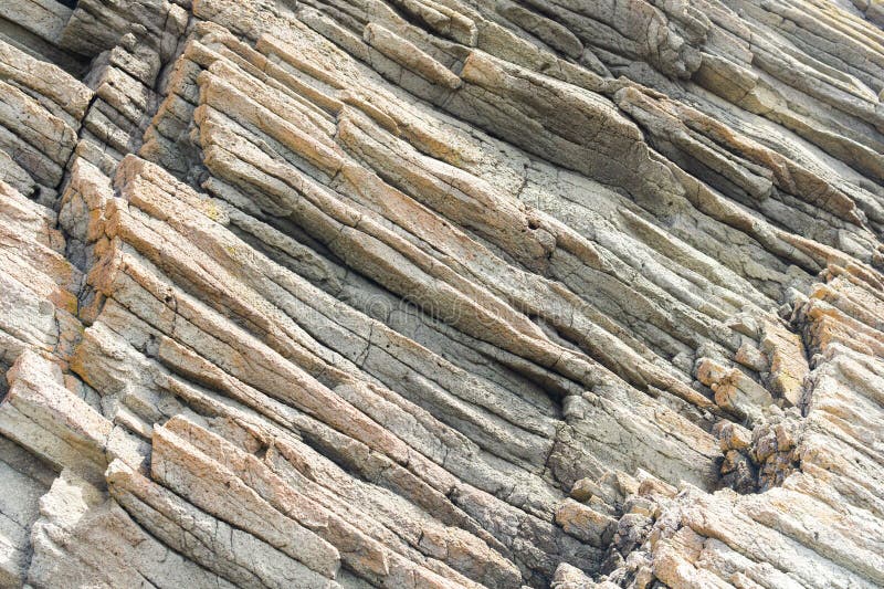 Natural background, rock fragment from volcanic lava columns stock photography
