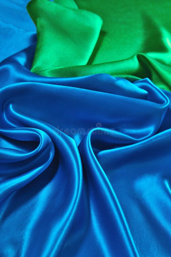 Natural Blue, Red, Golden and Green Satin Fabric Texture Stock Photo