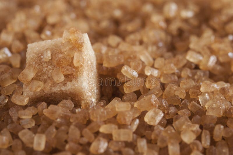 Natural brown sugar cubes stock photo. Image of sand 129757568