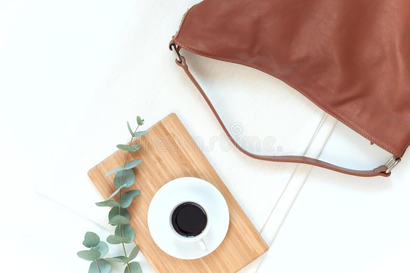 Natural color elegant flat lay with bag royalty free stock image