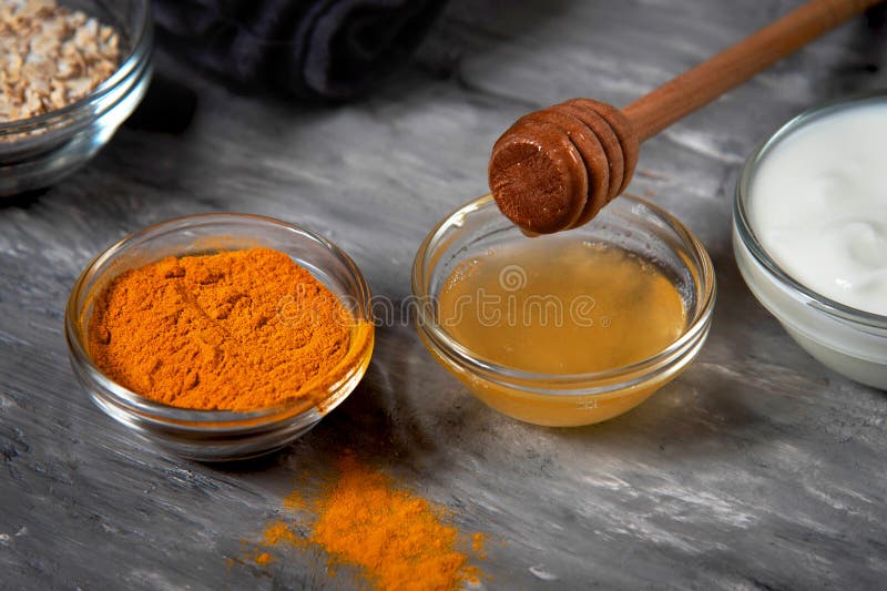Honey and turmeric powder for face