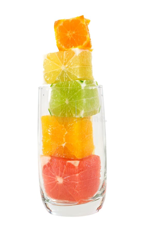Natural fruit juice abstract - citrus cubes in a glass. Natural fruit juice abstract - citrus cubes in a glass