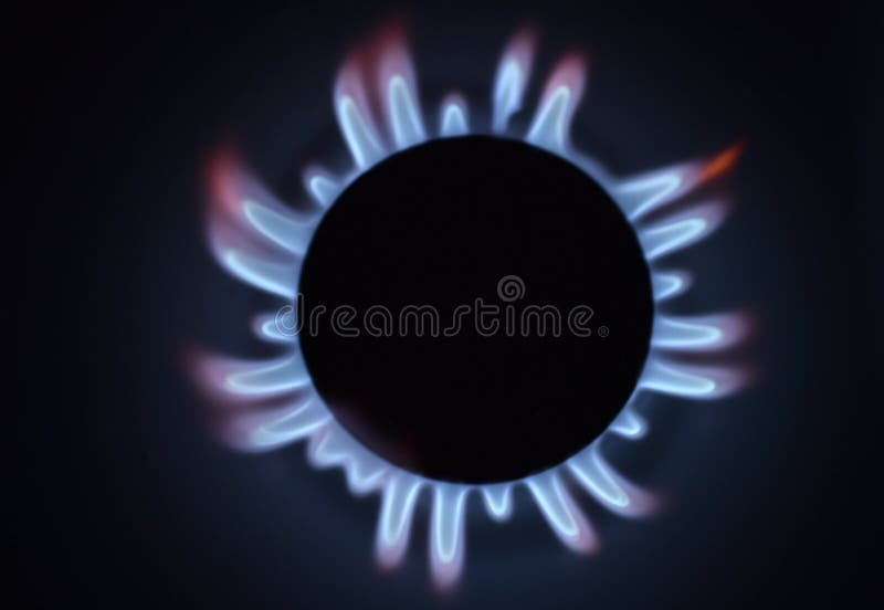 Natural Gas Burning a Blue Flames on Black Background Stock Photo
