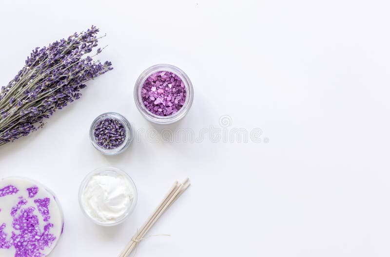 Natural herb cosmetic with lavender flatlay on white background top view mockup. Natural herb cosmetic with lavender flowers flatlay on white table background stock photos Natural herb cosmetic with lavender flatlay on white background top view mockup. Natural herb cosmetic with lavender flowers flatlay on white table background stock photos