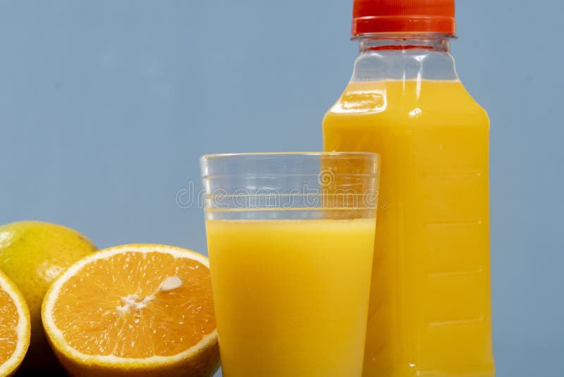 Natural orange juice in the glass royalty free stock image