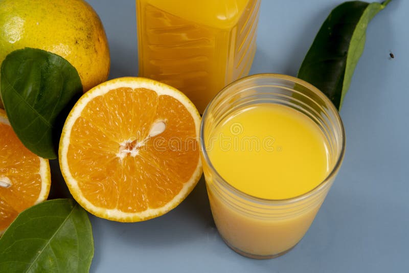 Natural orange juice in the glass royalty free stock images