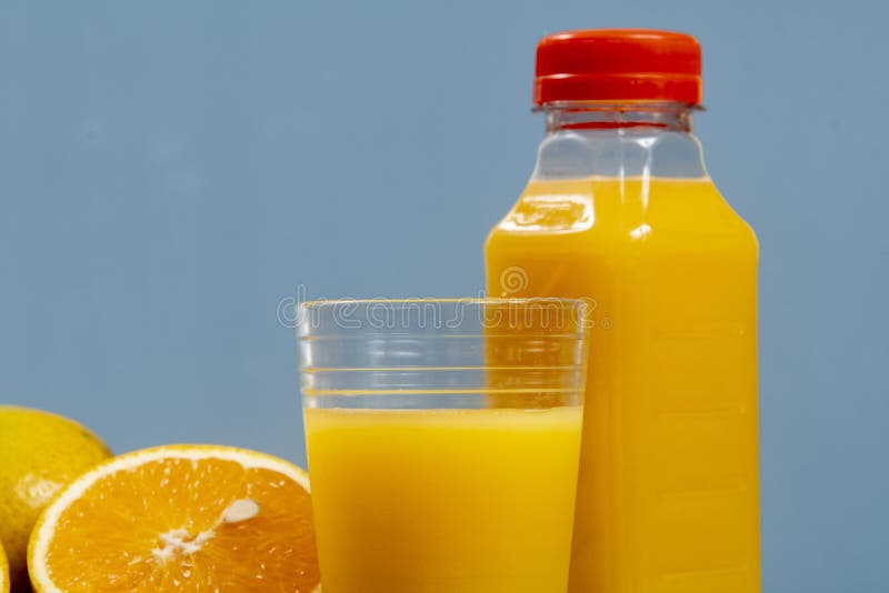Natural orange juice in the glass royalty free stock images