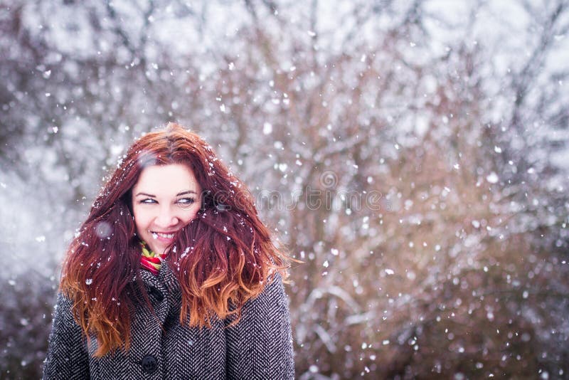Natural portarit of young woman in snowy weather stock photography Natural portarit of young woman in snowy weather stock photography