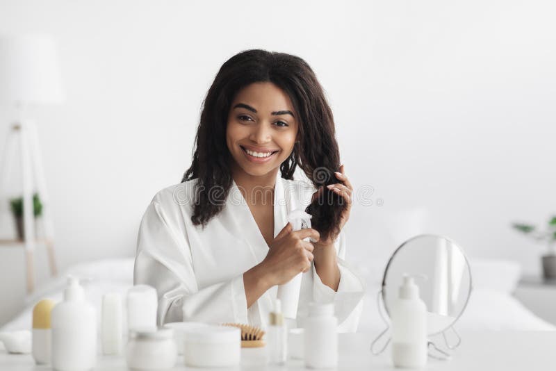 African American Woman Applying Hair Oil Stock Photos - Free & Royalty-Free Stock Photos from Dreamstime African American Woman Applying Hair Oil Stock Photos - Free & Royalty-Free Stock Photos from Dreamstime