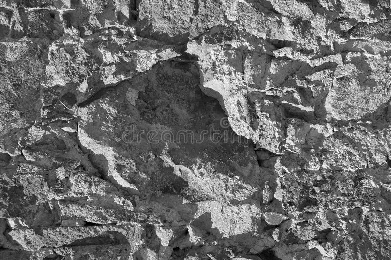 Natural Rock Texture Background for Design Projects and Textures. High-resolution close-up of a rugged rock surface displaying intricate textures and natural patterns. ideal for backgrounds, design projects, or textures in creative works, showcasing the beauty of natural formations.