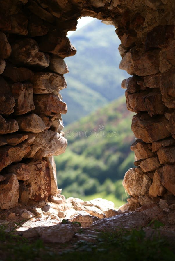 Natural rock window of old fortress