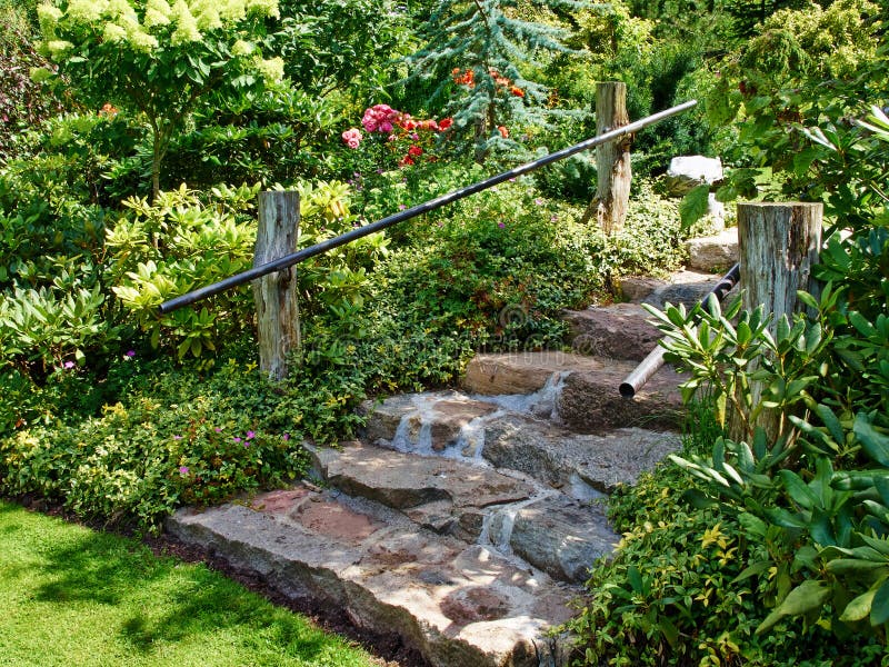 Natural stone stairs landscaping in home garden stock photography Natural stone stairs landscaping in home garden stock photography