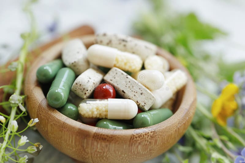 Natural suplements pills, alternative medicine with herbal plants extracts pills