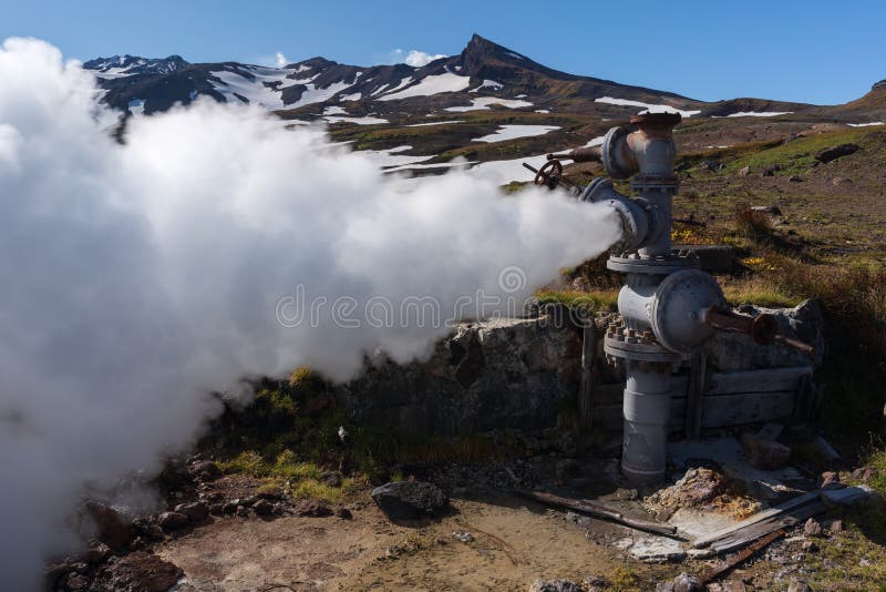 Natural thermal mineral steam-water emission from geological well stock photography Natural thermal mineral steam-water emission from geological well stock photography