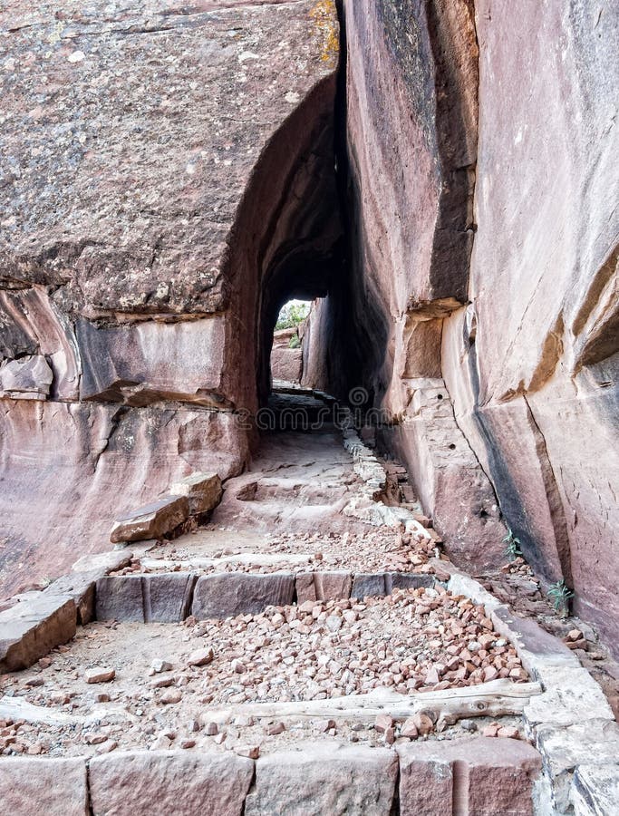 Natural tunnel on a trail stock photo Natural tunnel on a trail stock photo