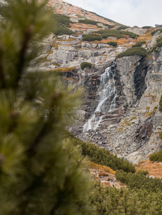 A natural waterfall by a hiking trail in the Tatras in Slovakia