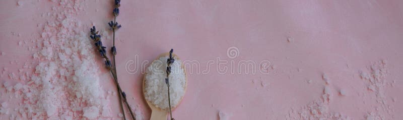Natural wellness beauty ingredients on pink background. Health care spa therapy with sea salt and lavender