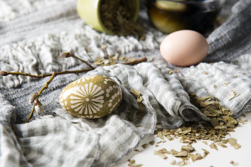 Naturally with Wax and Mate Tea Decorated Easter Eggs. Stock Photo