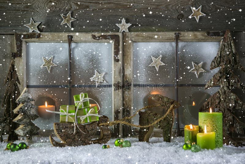 Natural wooden christmas decoration with candles and green gift boxes. Natural wooden christmas decoration with candles and green gift boxes.