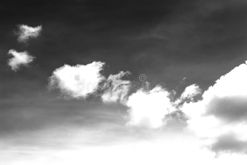 Nature background 3912 Sky with white puffy clouds black and white stock photo