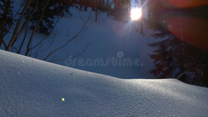 Nature covered in the snow during cold Winter in the country on the hills.