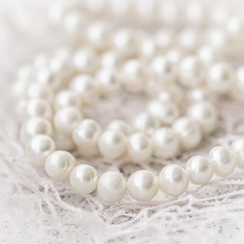 Nature White String of Pearls in Soft Focus, with Highlights Stock