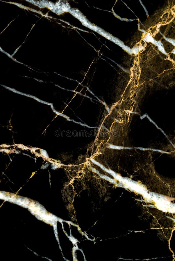 Naturlig guld- marmortexturbakgrund arkivfoto
