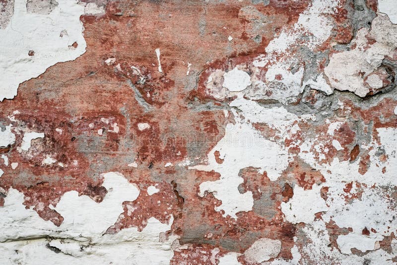 Naturligt förstörd stenyta Rustiskt mönster för vinskörd Brun bakgrund Gammal trasig stucco Smutsig vägg, grym textur royaltyfria bilder Naturligt förstörd stenyta Rustiskt mönster för vinskörd Brun bakgrund Gammal trasig stucco Smutsig vägg, grym textur royaltyfria bilder