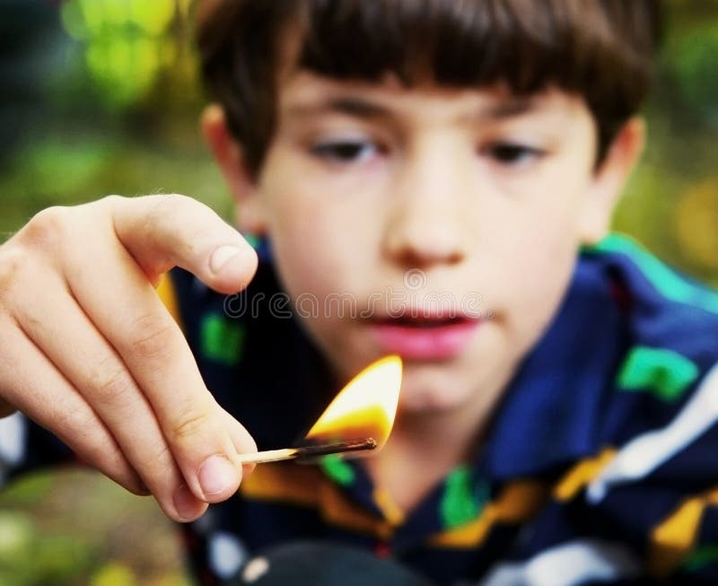 Little girl playing with matches kid in dangerous Vector Image